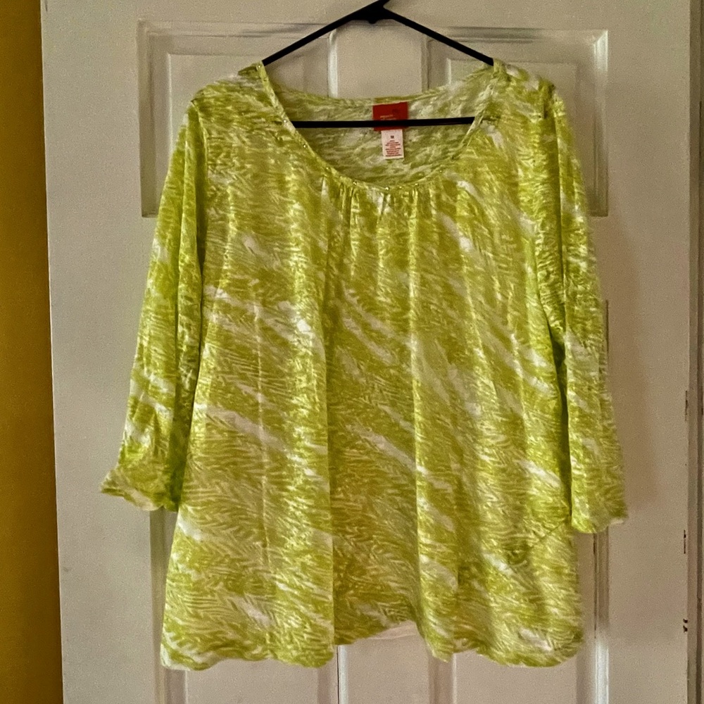 Lime green top over a white tank top